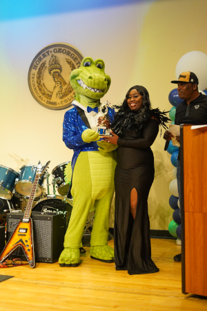 Chomp giving an award