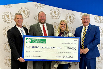 Bryan Lenertz and Taylor Anderson with Anderson Brothers Bank present the $10,000 check to the HGTC Foundation for Giving Tuesday. (left to right) Bryan Lenertz, Anderson Brothers Bank Senior Vice President – Regional Executive; Taylor Anderson, Anderson Brothers Bank Vice President, Branch Manager – Georgetown; Shannon Detzler, HGTC Foundation President & CEO; Harold Hawley, HGTC Vice President for Finance & Administration