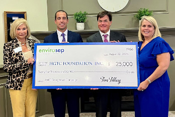 Mr. Tim Tilley, CEO for Envirosep, presents the $25,000 check to the HGTC Foundation.