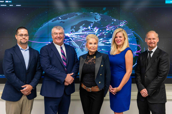 Horry-Georgetown Technical College President Dr. Marilyn Fore (center) joins college leaders in the Security Operations Center on the Conway Campus, highlighting HGTC’s cybersecurity program and the College’s recent designation as a National Center of Academic Excellence in Cyber Defense (CAE-CD) through academic year 2031.