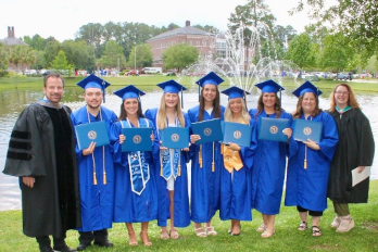 HGTC Radiologic Technology Graduates take photo with professors after the 2025 Commencement Ceremony on May 13.