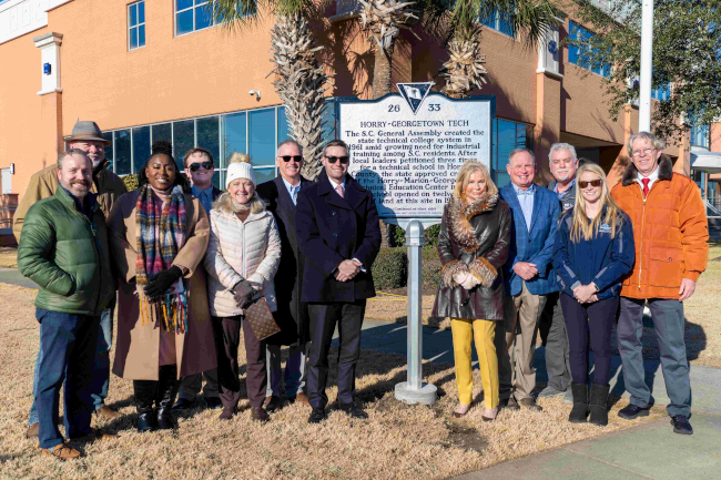College and county leaders unveil a state historical marker honoring the founding and growth of Horry-Georgetown Technical College during a ceremony on the Conway Campus.